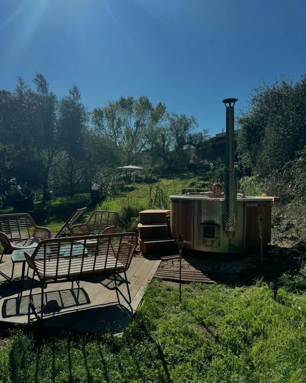 Soaking in the hot tub on a sunny morning — this could be you